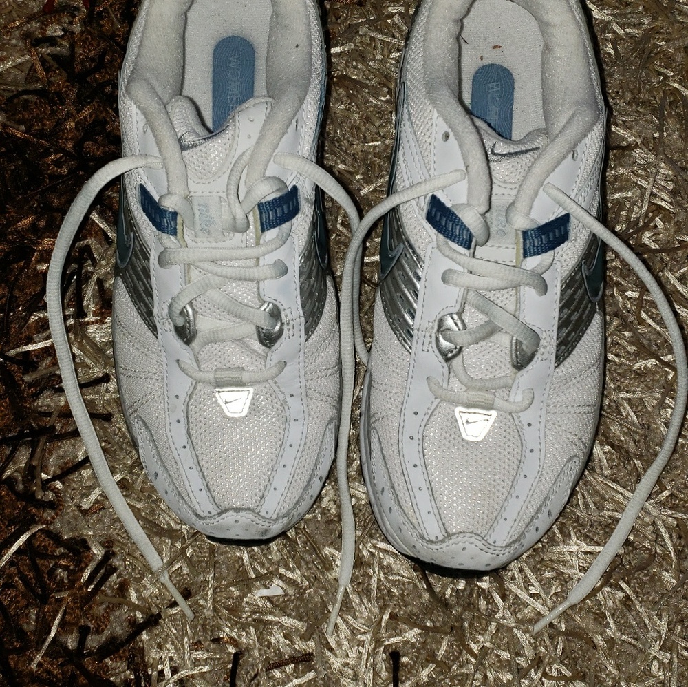 White Nike running shoe